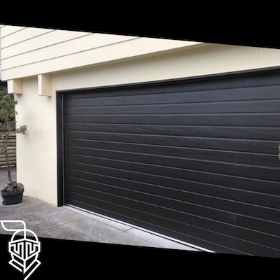 Garage doors repair for property manager - Auckland